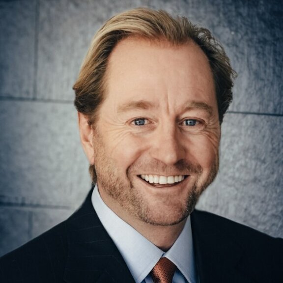 photo of director Kjell Inge Røkke 